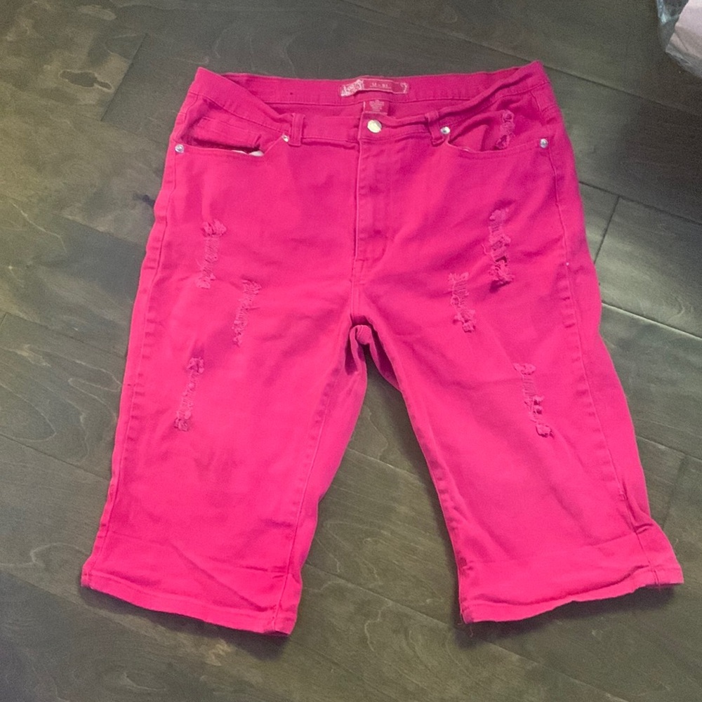 Pink distressed jean shorts